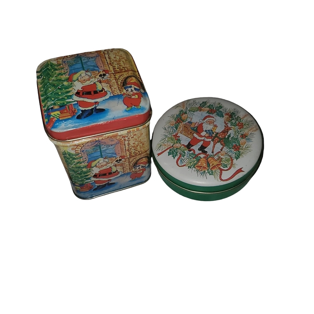 Vintage Christmas tins with candles inside